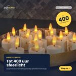 Na zdjęciu widać złotą tacę z ładowalnymi świeczkami LED 3D marki DORSETTO, zestaw 6 sztuk, z których każda emituje ciepłe światło. W opisie podkreślono czas pracy do 400 godzin oraz pilot i timer – idealne do stworzenia przytulnej atmosfery.