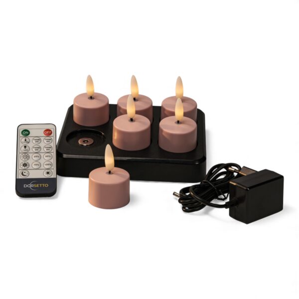 Zestaw różowych ładowalnych podgrzewaczy LED zawiera 6 różowych podgrzewaczy (do 400 godzin świecenia), czarną podstawę ładującą, pilot oraz zasilacz.